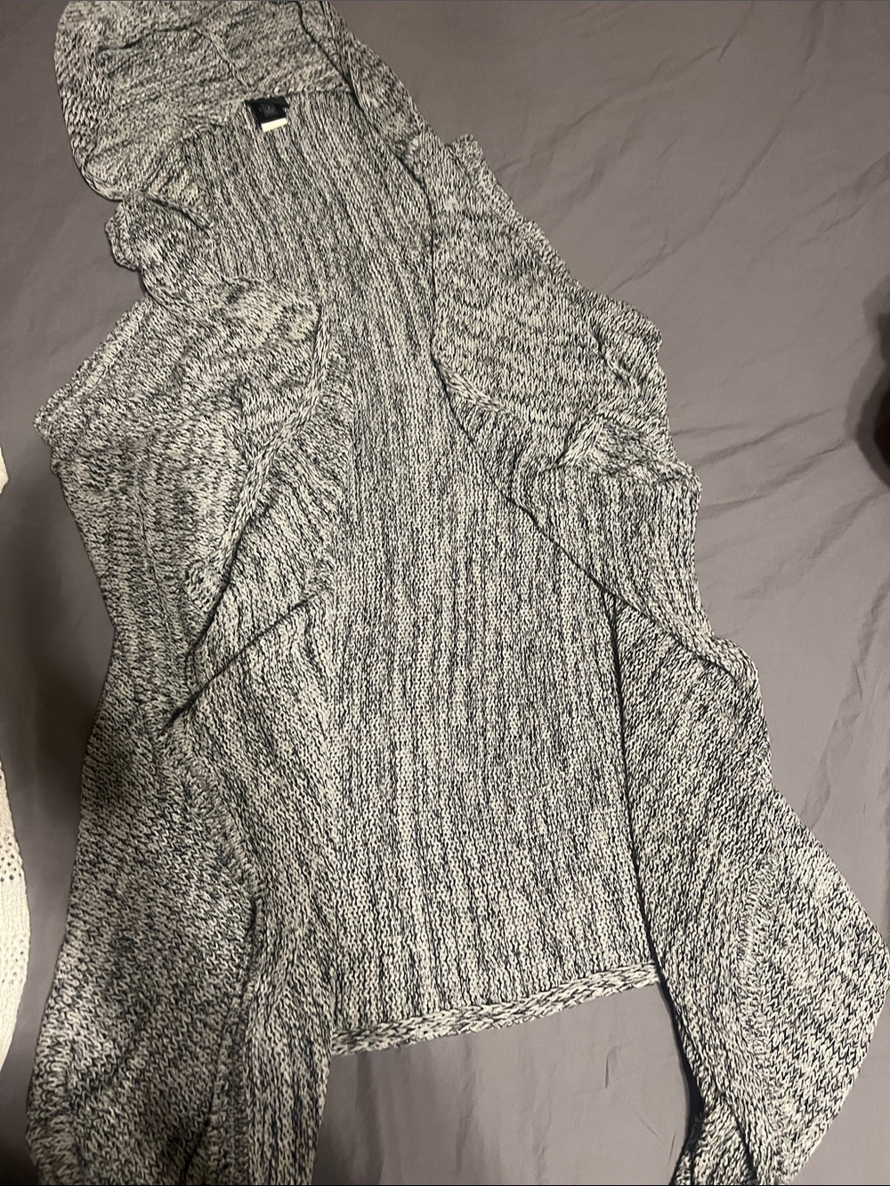 Open high low sweater vest